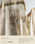 Textile with gold and beige patterns, featuring the brand 'hikmarituals' and 'Meru'